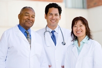 Photo of three doctors standing together
